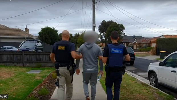 Two men have been arrested after an investigation into travelling conmen operating a roof scam in Melbourne's east.
