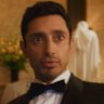 Riz Ahmed (right) plays obscure actor Shah Latif, who flubs a screen test to become the new James Bond - but then the internet loses its mind over a Muslim 007.
