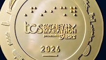 The Sydney Marathon medal has a stadium etched in that is definitely not part of the course.