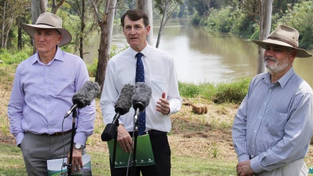 Scenic Rim mayor Greg Christensen (left), Council of Mayors chairman Graham Quirk and Ipswich administrator Greg Chemello launch the $2 million plan to repair the Bremer River.
