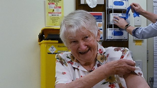 Prime Minister Scott Morrison (left) and Jane Malysiak (right) receiving their COVID-19 booster vaccination in November.