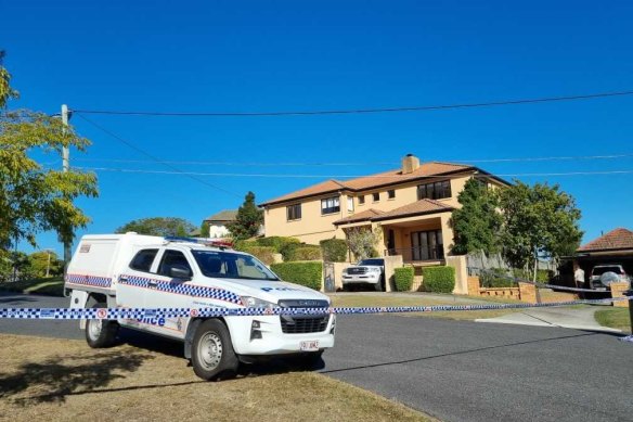 Police outside the Coorparoo home of former Wallaby Toutai Kefu after the violent break-in.