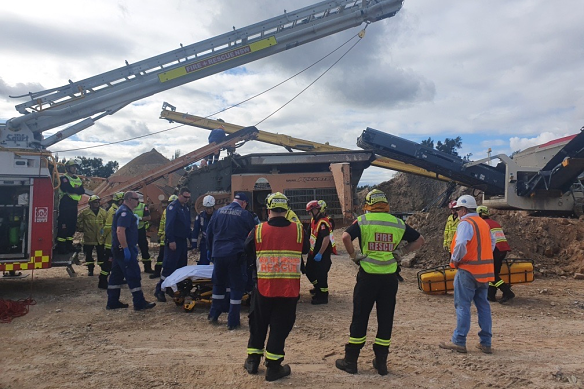 Fire and Rescue NSW safely removed a man who was trapped in rock crushing machinery at a quarry in Railway Street, Emu Plains this afternoon.