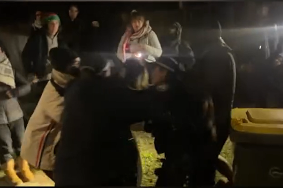 Video posted to Instagram that was filmed during an altercation between NSW Police and protesters at a picketing of a business in Belmore on Friday. 