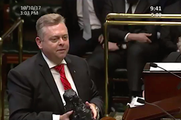 Anthony Roberts brandishing a lump of coal in NSW Parliament in 2017.