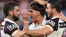 Adam Reynolds, Reece Walsh, and Ben Hunt of the Broncos.