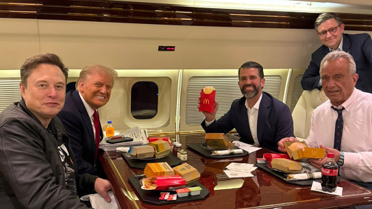 Elon Musk, US President-elect Donald Trump, Donald Trump jnr, Mike Johnson and Robert F. Kennedy enjoy a McDonald’s meal aboard Trump’s private plane.