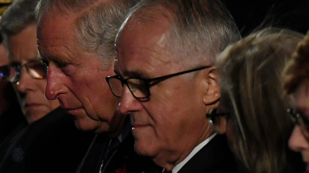 The Portaloo wasn't too far ... then Prime Minister Malcolm Turnbull with Prince Charles at the Anzac Day dawn service at Villers-Bretonneux last year. 