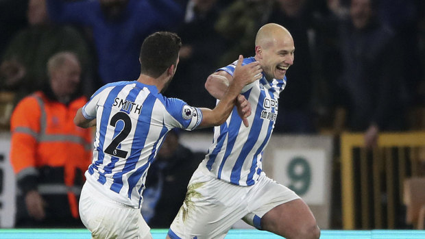 Recovery: Huddersfield's Aaron Mooy (right) has recovered from the injury that kept him out of the Asian Cup.