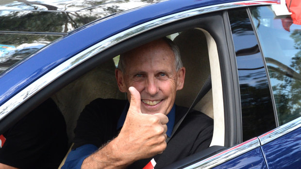 Former Greens leader Bob Brown leaves in a Tesla vehicle after attending an anti-Adani rally in Sydney.