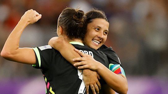 Sam Kerr and Caitlin Foord celebrate the win.