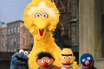 Big Bird, pictured with other members of the Sesame Street gang, says he has gotten the COVID vaccine.