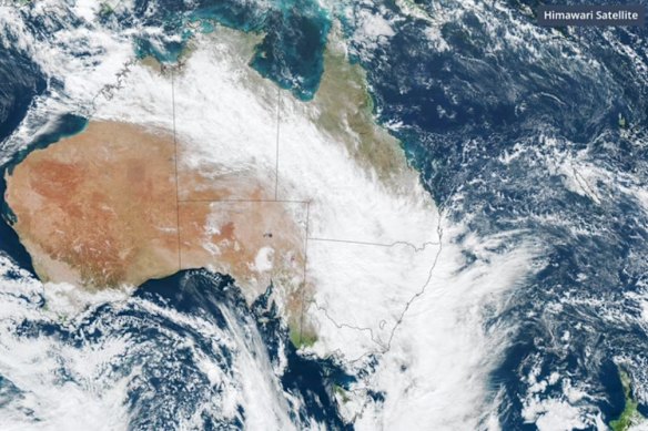 The large north-west cloudband generating heavy rain in Brisbane.