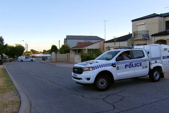 Police and detectives outside a Perth home in Nollamara, after a 26-year-old woman was found seriously injured. She later died in hospital.
