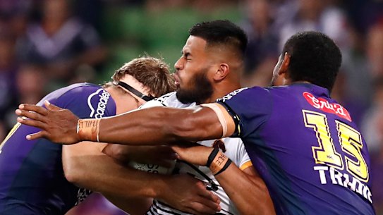 Payne Haas charges into the Storm defence.