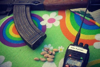 A photo of a gun and radio that Brookman published on Instagram while in Syria in 2014.