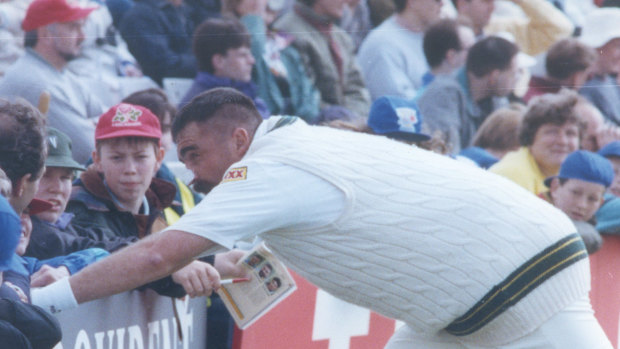Merv Hughes gets familiar with the crowd at Old Trafford in 1993.