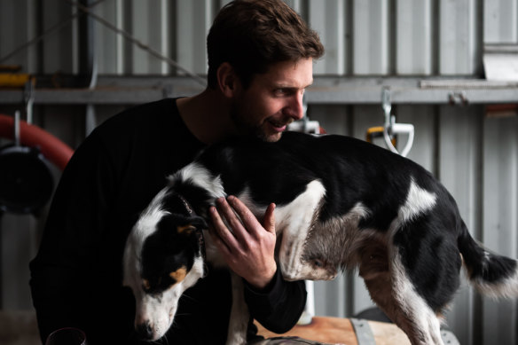 LS Merchants winemaker Dylan Arvidson with his dog Flash.
