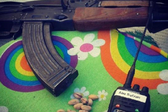 A photo of a gun and radio Adam Brookman published on Instagram while in Syria in 2014.