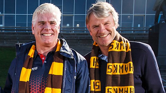 Andy Gowers, right, with 1991 Hawks premiership teammates Gary Ayres and Darrin Pritchard. Ayres endorsed Gowers for president at the online rally on Sunday. 