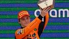 McLaren driver Oscar Piastri of Australia celebrates after winning the Spanish Grand Prix.