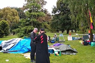 Demonstrators set up camp at the gates of Government House in Victoria to protest the passing of the pandemic bill. 