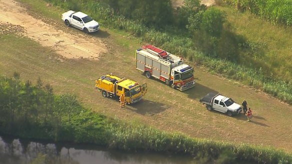 Emergency services near the plane wreckage.