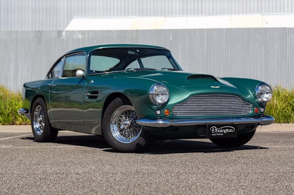 A 1960 Aston Martin DB4 Series II Coupe.