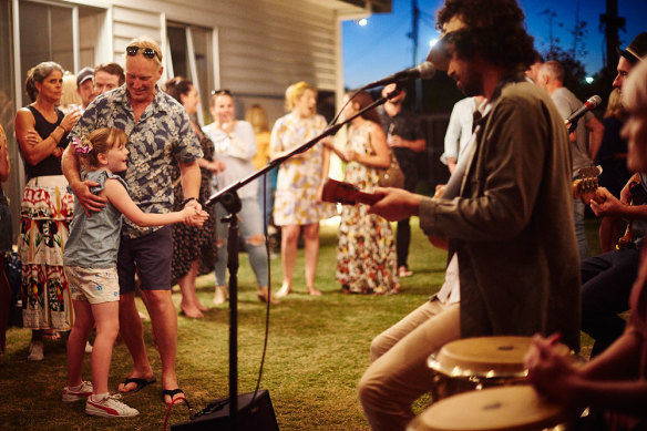 Bobby Alu performs at a backyard gathering for Parlour Gigs. 