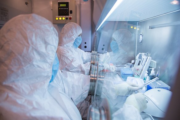 Lab workers at the Irkutsk Antiplague Research Institute of Siberia and the Far East. This undated photo was released in 2019.