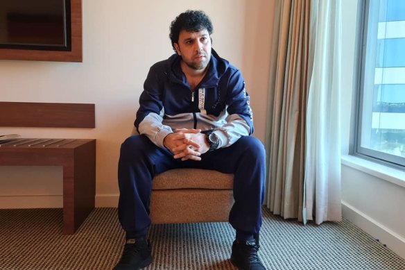 Afghan refugee Faridullah Mohibi is in hotel quarantine in Sydney after fleeing from Kabul with his wife and five children.