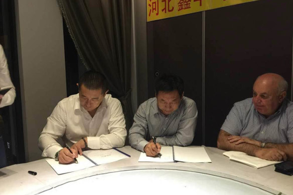 Wensheng Liu, Yuqing Liu and Vince Badalati at the signing ceremony in Sydney’s Chinatown.