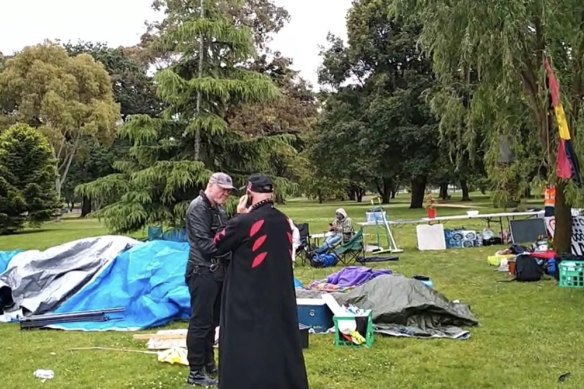 Demonstrators set up camp at the gates of Government House in Victoria to protest the passing of the pandemic bill. 