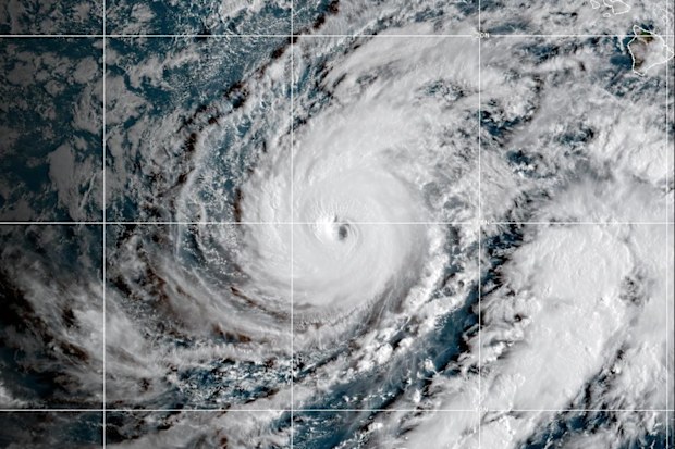 This satellite image released by NOAA shows Hurricane Lowell approaching Hawaii, Sunday, Sept. 6, 2026. (NOAA via AP)