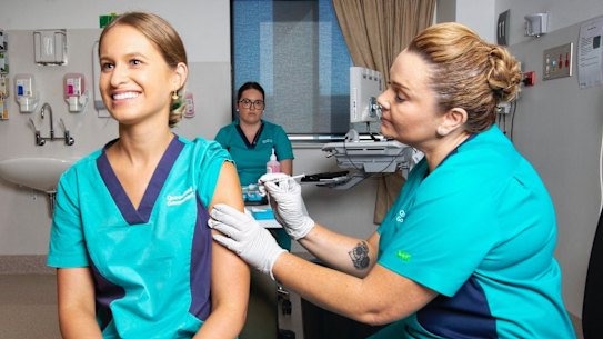 Quarantine, Border Force and healthcare workers all began receiving their first COVID-19 vaccines on Monday.