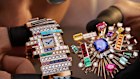 The colourful brooch of the Gioco di Forme e Colori watch detaches to reveal its dial. 