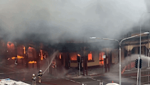 The inferno was so strong it virtually shut the city down for the day.