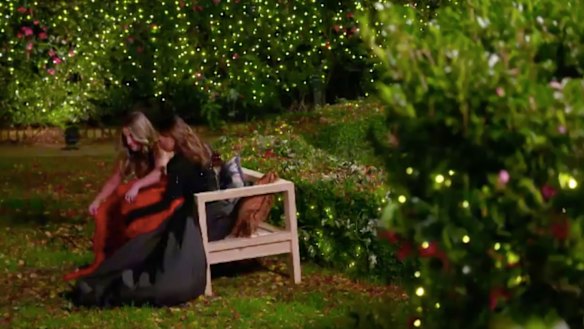 Jess sat with Brooke on the bench that Konrad built. 