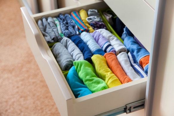 Lovingly folded piles of neat clothing Marie Kondo-style will bring you more joy than negativity.