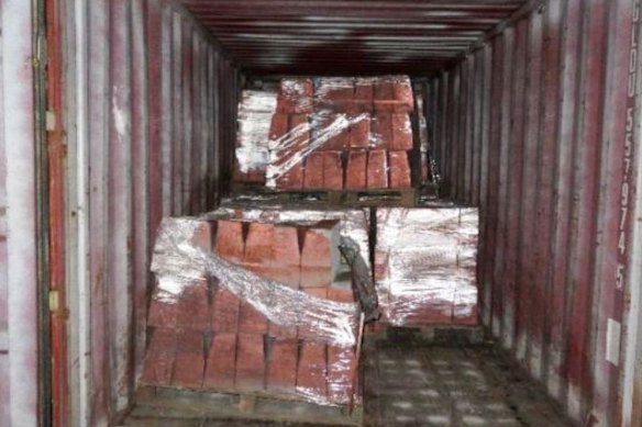 About 6000 tonnes of blister copper in more than 300 containers were switched with jagged paving stones, spray-painted to resemble the semi-refined metal.