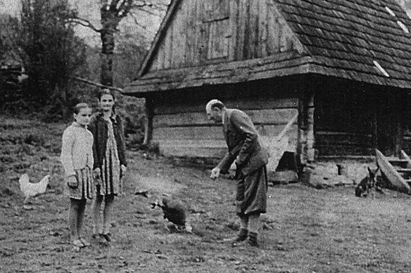 Peter Shmigel’s mother Nadia Gladyshowsky (left), aunt Olya Gladyshowsky (centre) and grandfather Oleksandr Gladyshowsky on the family farm in Ukraine, circa 1943.