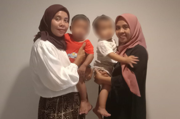 Indonesian women Siti Mauliah and Dian Hartono have raised each other’s son for the past year as a result of alleged negligence by the hospital where they gave birth.