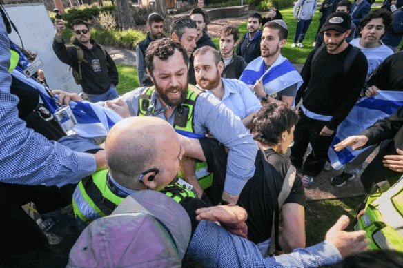 University orders removal of ‘Zionist not welcome’ signs as protests escalate