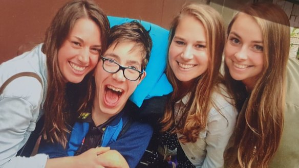 Alex Graham with his three sisters.