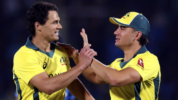 Nathan Coulter-Nile and Marcus Stoinis, pictured here celebrating a wicket in that Twenty20 series, are part of the current ODI World Cup squad.