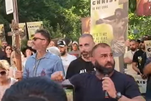 Christian Sukkar (right) and Christian Lives Matter organiser Charlie Bakhos (centre) at a rally on March 11.