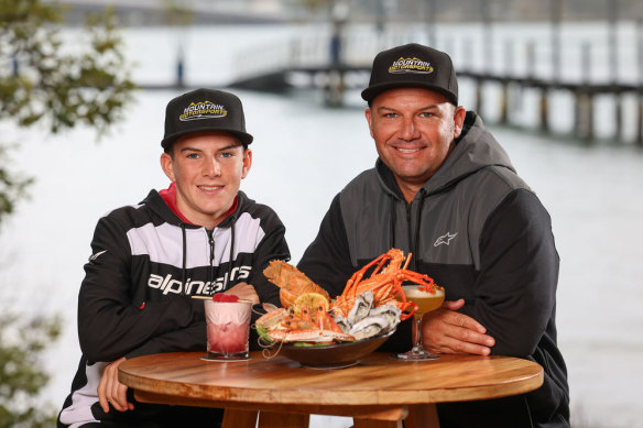 Tate Reed and father Chad Reed soaking up Moreton Bay before the Australian Supercross Championships begin in Redcliffe.