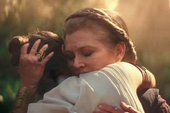 Dead, not dead: Rey (Daisy Ridley) is embraced by General Leia (Carrie Fisher) in The Rise of Skywalker. 