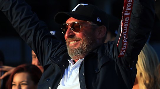 Toronto Wolfpack owner David Argyle, left, lifts the Championship 1 Promotion Trophy in 2017.