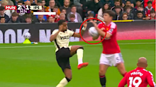 Harry Maguire’s arm makes contact with the ball.